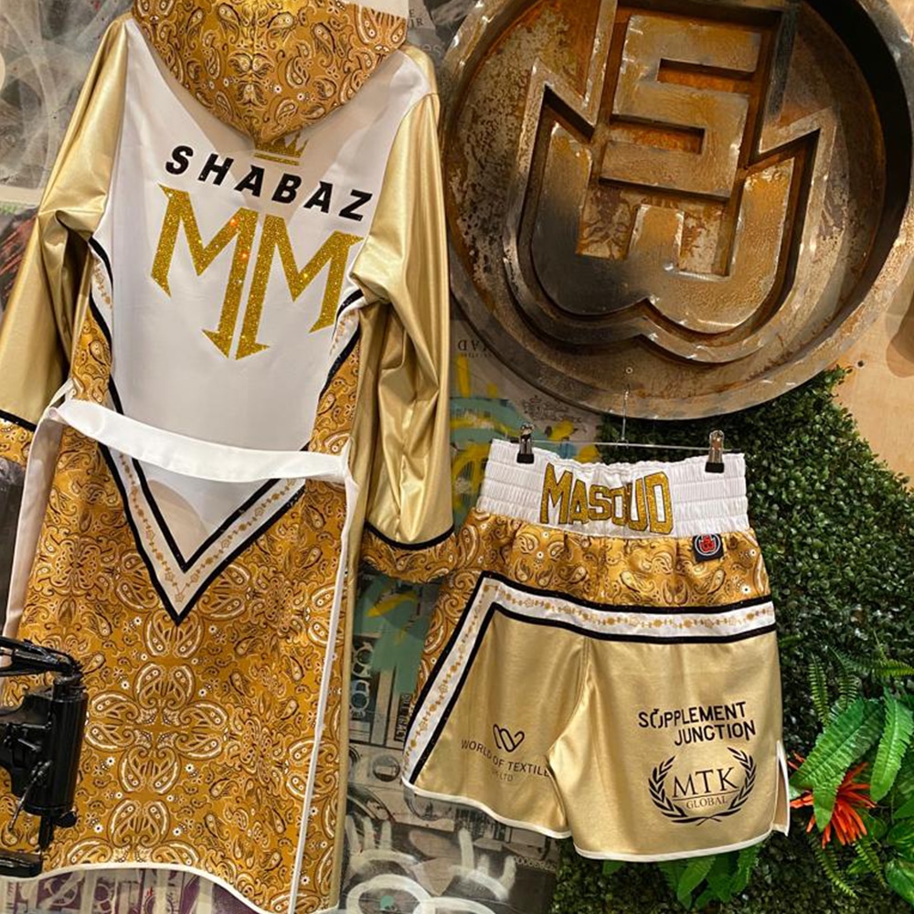 Shabaz Masoud Gold Leather and Paisley Custom Boxing Shorts and Custom Boxing Robe Back View Studio Angle