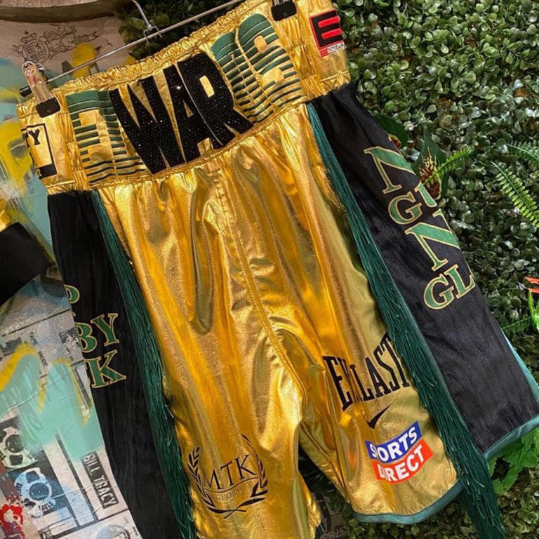 Sunny Edwards Gold Wet Look Black Velvet Tassel Custom Boxing Shorts Front View