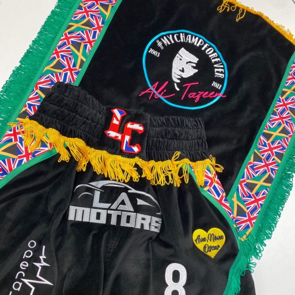 Lennox Clarke Black Velvet British Jamaican Print Custom Boxing Shorts and Custom Boxing Poncho Front Close Up