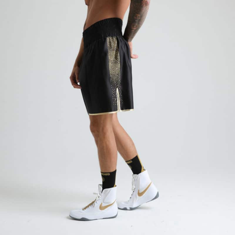 Gold Crystal Covered Handmade Boxing Shorts on Model
