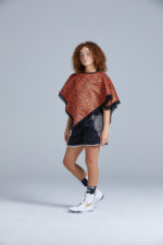 Black and Orange Cheetah Print Poncho on Female Boxer