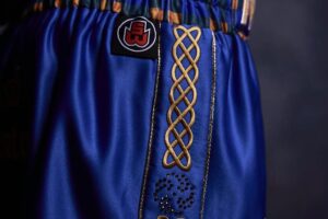Crafting a Custom Boxing Kit: The Story Behind Molly McCann's Iconic Debut Shorts Custom Boxing Kit by Suzi Wong