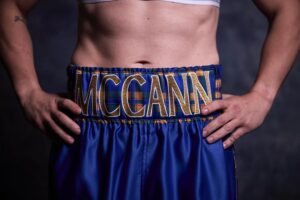 Crafting a Custom Boxing Kit: The Story Behind Molly McCann's Iconic Debut Shorts Custom Boxing Kit by Suzi Wong
